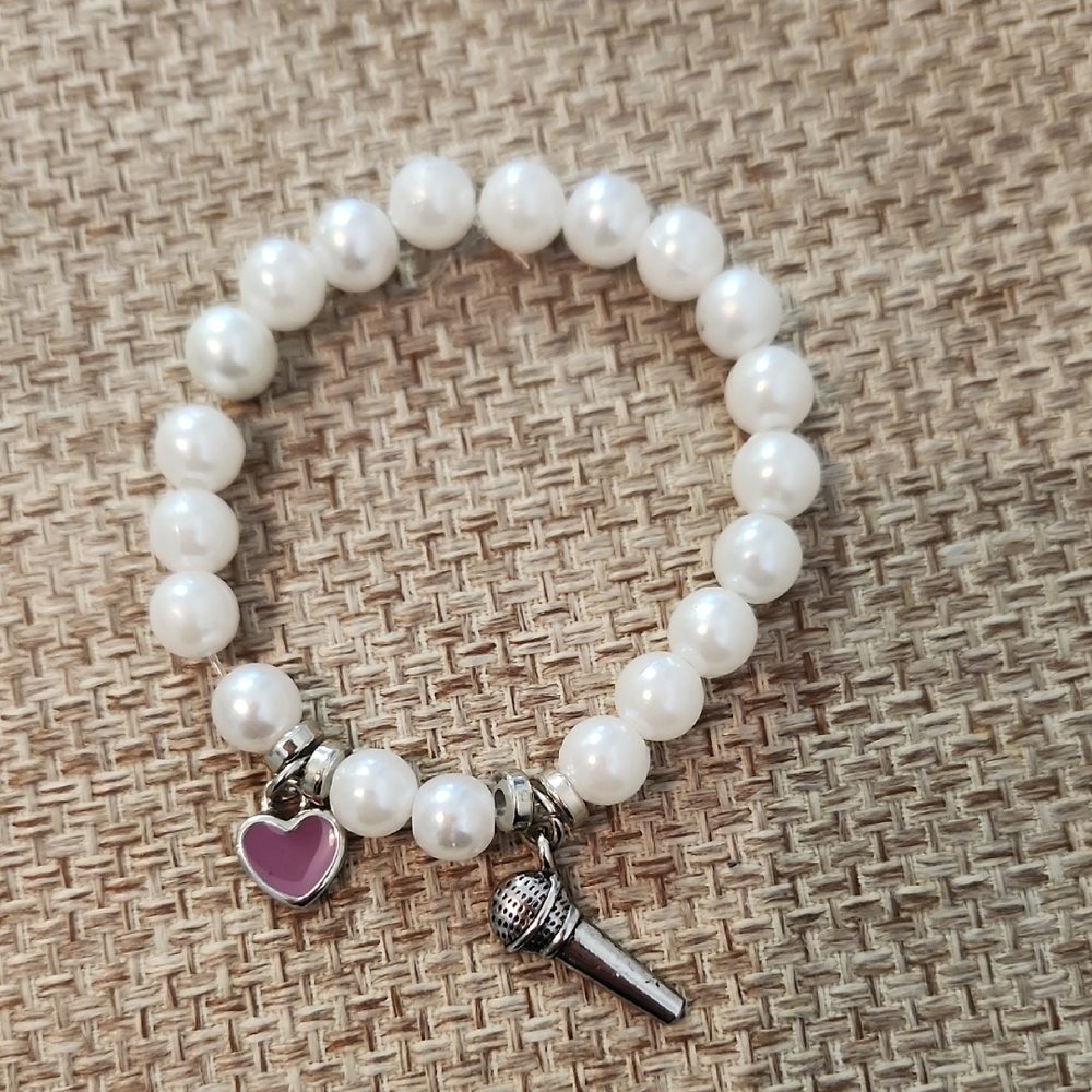 Elegant Pearl Bracelet with Charms